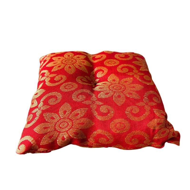 Coussin rouge pour bol chantant